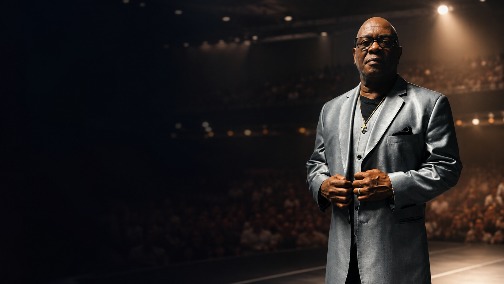 Ray Houston, Mr. Determined, speaking on stage before a live audience